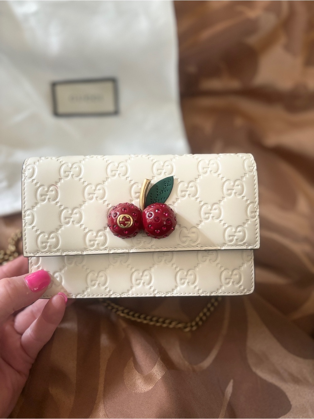 Gucci Cream Embossed GG Mini Bag with Red Cherry Accent
